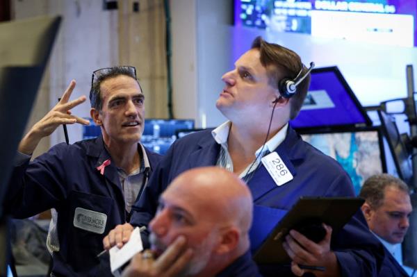 The Dow Jones Industrial Average hit an all time high of 41,585.21 before closing at 41,563.08.